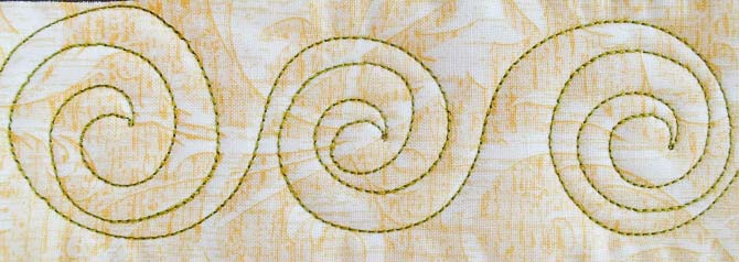 Spirals border design with Spagetti thread from WonderFil