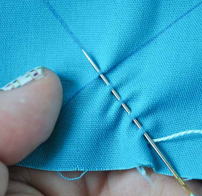 Stacking four stitches on the needle before pulling the thread through the fabric