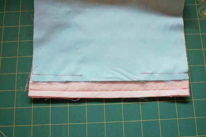 Sew across the bottom edges of the bag and the lining.