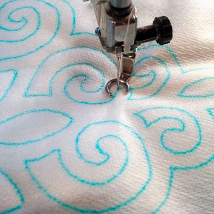 Stitch on marked lines with water-soluble thread