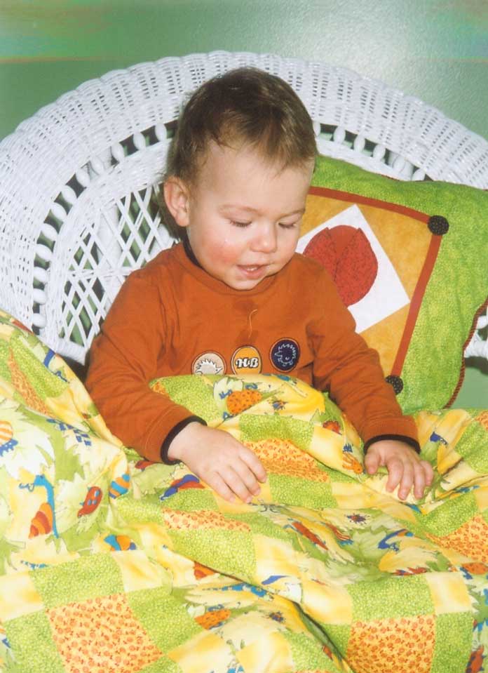 My kids were always intrigued by their quilts and would stare at the fabrics, geometric forms and quilting.